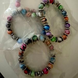 Very pretty.Good quality Multicolor mixed bracelets.Handmade.📿🧚🏼‍♀️😍$15 for2